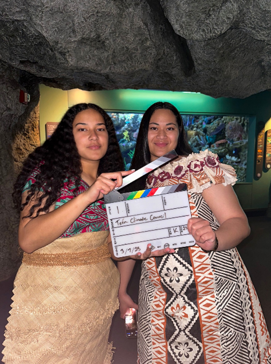 Two people and clapboard