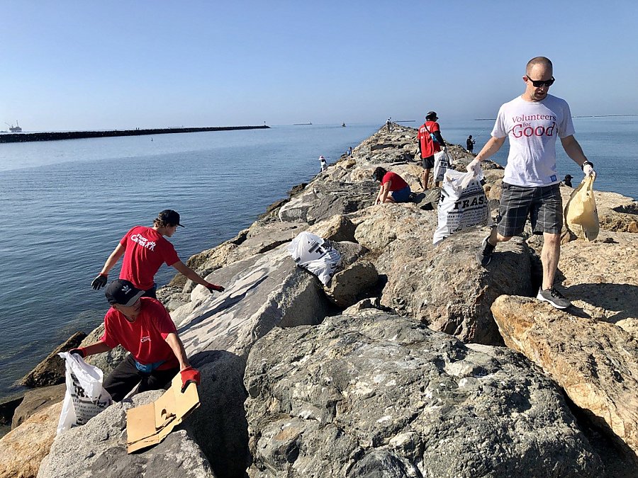 volunteers cleaning up trash on the peninsula